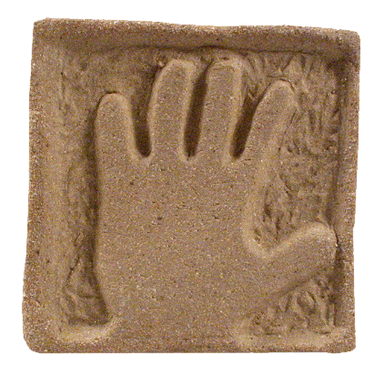 Handprint impression on clay, showcasing texture and details, ideal for pottery decoration or educational projects.