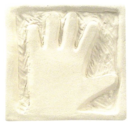 Handprint impression in unglazed clay slab, demonstrating sculpting technique for ceramics and pottery projects.