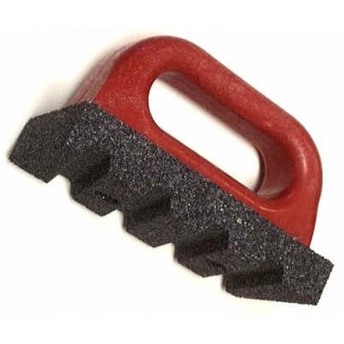 Red-handled sponge with a textured black surface, ideal for smoothing and finishing clay surfaces in pottery and ceramics.