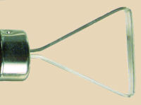 Metal carving tool with a triangular blade, used for precision detailing in ceramics and pottery applications.
