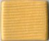 Yellow stoneware clay with a textured surface, ideal for handbuilding and sculpting in ceramic projects.