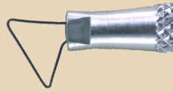 Metal loop tool for shaping and carving clay or pottery, featuring a textured handle for better grip and control.
