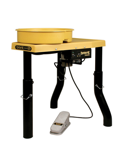 Brent Model 6 ceramic wheel with yellow splash pan, foot pedal, and sturdy black legs, ideal for pottery and clay projects.