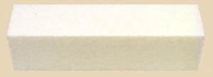 White ceramic bat for shaping and smoothing clay in pottery and sculpting. Ideal for ceramics studios and education.