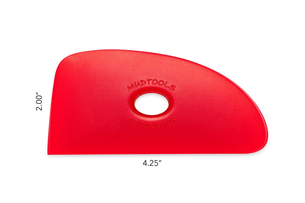 Red Mudtools rib for shaping clay, measuring 4.25x2, featuring a center hole for grip, ideal for pottery and sculpting.