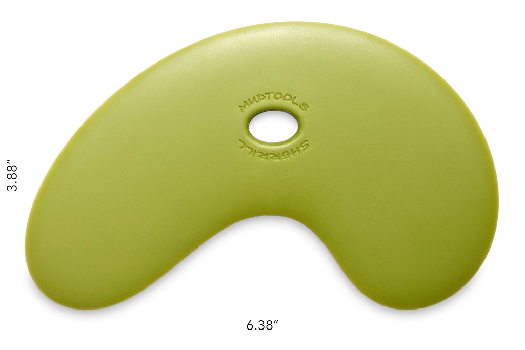Green flexible ceramic trimming tool with a rounded shape, featuring a central hole for easy handling and precise use.