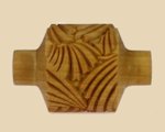 Textured wooden pottery tool for decorating with leaf patterns, used in shaping and enhancing ceramic surfaces.