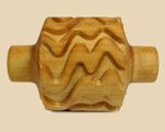 Textured wooden rolling pin used for creating patterns in clay, ideal for decorating ceramics and pottery projects.