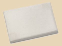 Block of white stoneware clay for pottery, ideal for hand-building and sculpting projects at Georgies Ceramic & Clay Company.