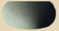 Metal rib tool for pottery shaping, featuring a serrated edge for texture application on clay surfaces.