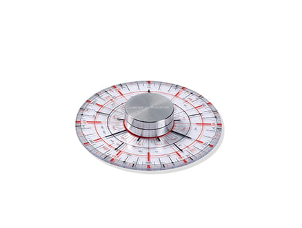 Ceramic color mixing wheel with red and gray markings, used for accurate glaze blending in pottery making.
