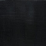 Black ceramic clay slab showcasing smooth texture, ideal for sculpting and pottery, perfect for studio work and firing.