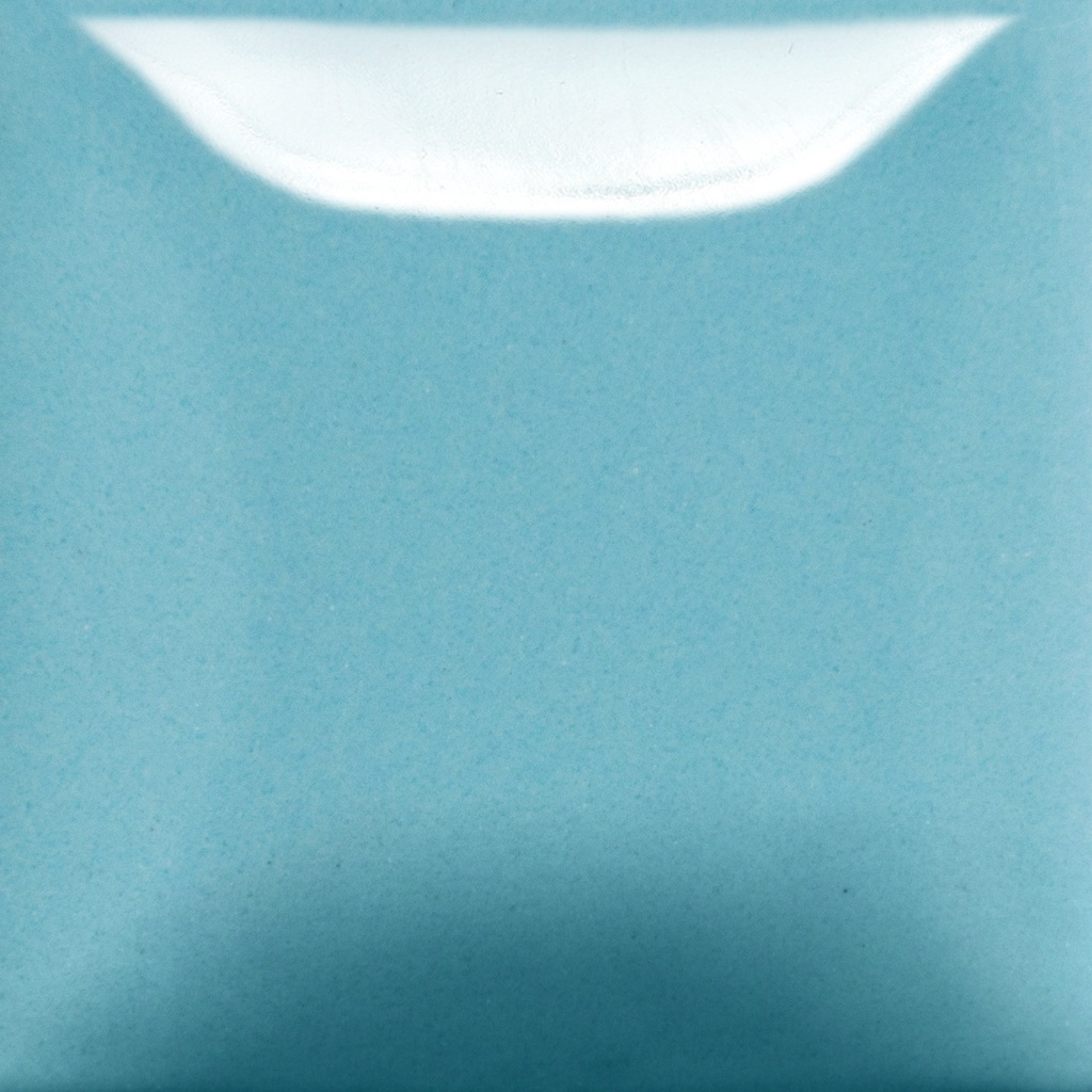 A smooth, glossy turquoise glaze sample showcasing a bright, light blue finish for ceramics and pottery projects.