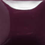 Glossy eggplant purple glaze sample for ceramics, suitable for various pottery techniques and kiln firing applications.