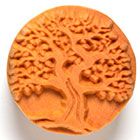 Tree design relief stamp made from terracotta clay, ideal for decorating pottery and ceramic projects.