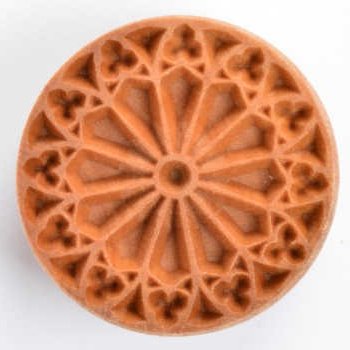 Terracotta ceramic stamp featuring an intricate floral pattern, ideal for decorating pottery and clay projects.