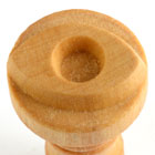 Wooden pottery tool with a rounded top and a central indentation, ideal for shaping and smoothing clay surfaces.