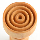 Close-up of a spiral-textured clay stamp tool used for decorating pottery and ceramics at Georgies Ceramic & Clay Company.