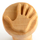 Wooden hand stamp for clay, used to create handprints in pottery or sculpture. Ideal for decorating ceramic pieces.