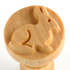 Wooden stamp featuring a rabbit design, ideal for creating decorative patterns in clay or pottery projects.