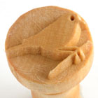 Carved clay stamp featuring a bird design, used for decorating pottery and ceramics at Georgies Ceramic & Clay Company.