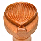 Ceramic stamp featuring a shell design with ridges, used for decorating pottery and clay projects at Georgies Ceramic & Clay Company.