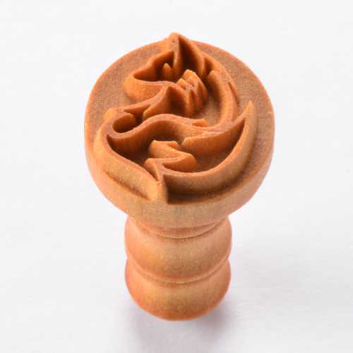 Ceramic stamp featuring a floral design, ideal for decorating pottery and clay projects at Georgies Ceramic & Clay Company.