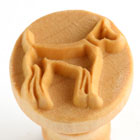 Dog-shaped clay stamp with textured design, suitable for pottery and ceramic projects at Georgies Ceramic & Clay Company.