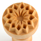 Ceramic texture stamp with a star pattern, ideal for adding decorative elements to clay pieces.