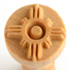 Ceramic texture stamp featuring a Native American-inspired design for pottery decoration, made from unglazed clay.