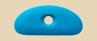 Blue silicone rib tool for shaping and smoothing clay surfaces in pottery and ceramic crafting. Ideal for studio use.