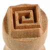 Ceramic texture tool with a spiral pattern, used for decorative effects on pottery and clay projects.