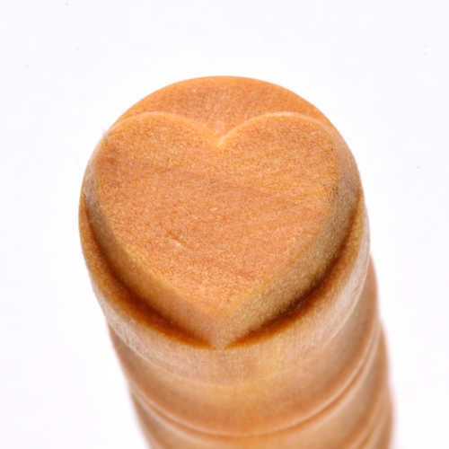 Heart-shaped ceramic stamp made from clay, ideal for decorating pottery and enhancing clay projects at Georgies Ceramic & Clay Company.