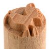 Wooden pottery stamp with a carved design of a bird, used for decorating ceramics and clay projects at Georgies Ceramic & Clay Company.