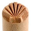 Wooden texture stamp tool with a starburst design, used for decorating clay pottery and ceramics at Georgies Ceramic & Clay Company.