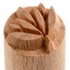 Wooden ceramic carving tool with a leaf pattern, used for decorating pottery and clay surfaces in ceramic art.