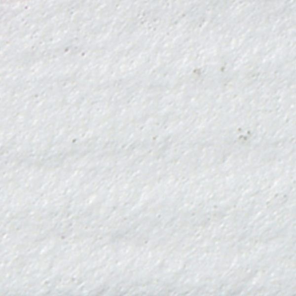 Close-up of a smooth, white clay surface, showing fine texture ideal for pottery and sculpture at Georgies Ceramic & Clay Company.