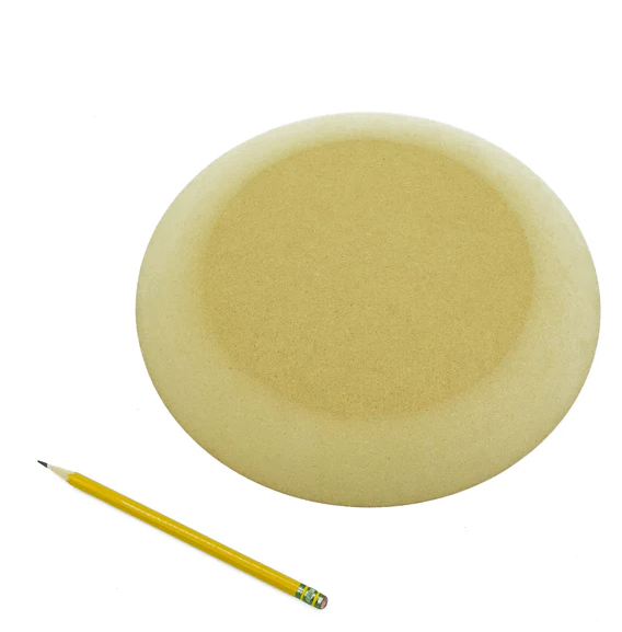 Round ceramic plaster bat for pottery, surrounded by a yellow pencil, ideal for shaping or decorating clay projects.