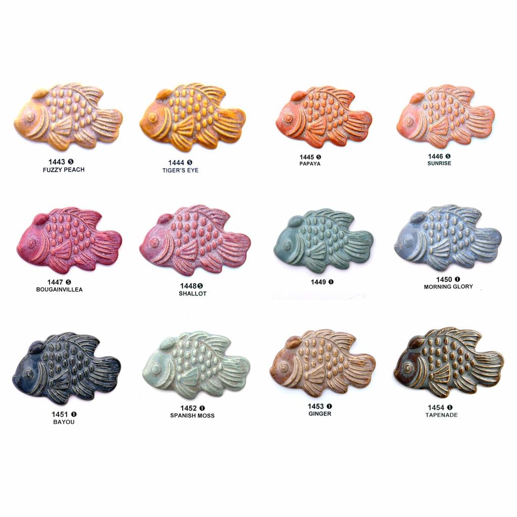 Colorful fish-shaped ceramic tiles showcasing various glazes: Fuzzy Peach, Tiger's Eye, Papaya, and others.