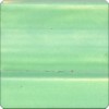 Soft green ceramic glaze sample with subtle variations in color, ideal for pottery and decorative pieces.