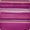 Swatch of vibrant magenta ceramic glaze, displaying smooth texture and glossy finish for pottery applications.