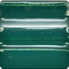 Deep green ceramic glaze swatch with glossy finish, showcasing a textured surface suitable for pottery and sculpture applications.