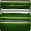 Close-up of glossy green ceramic glaze sample with subtle texture, ideal for pottery or sculpture decorating techniques.