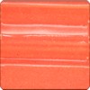 Bright orange ceramic glaze sample with a glossy finish, showing subtle ridges, ideal for pottery decoration and glazing.