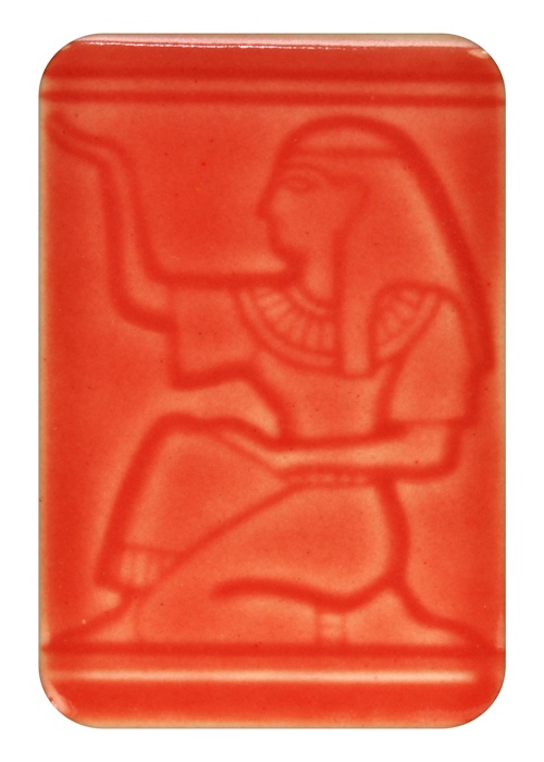 Relief tile in red clay depicting an Egyptian figure with intricate details, suitable for ceramic decoration or sculpture.