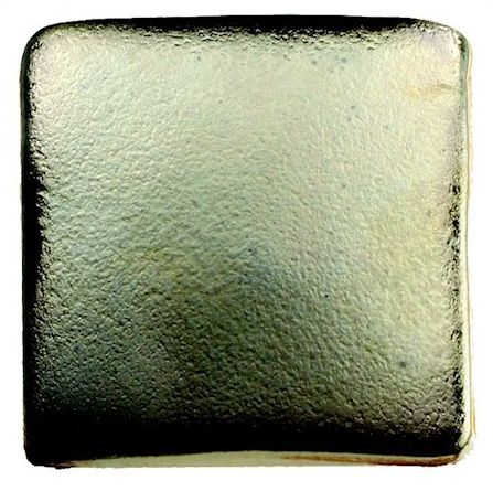 Glossy golden ceramic glaze sample square, showcasing a smooth texture, ideal for pottery and decorative applications.