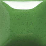 Glossy green ceramic glaze sample with subtle speckles, ideal for pottery and ceramic decoration applications.