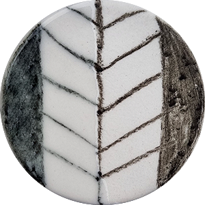Ceramic glaze sample featuring a textured leaf pattern in white and dark gray, ideal for pottery decoration and design.