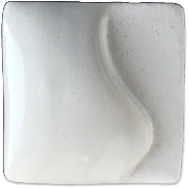 Glossy white clay tile with a smooth surface and subtle curved design, ideal for ceramic projects and artistic glazing.