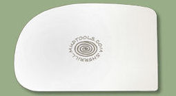 White trimming tool with a rounded edge, featuring the Sherrill logo, ideal for shaping and refining ceramic pieces.